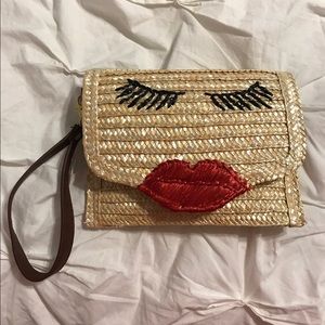 Boutique straw eyelash clutch