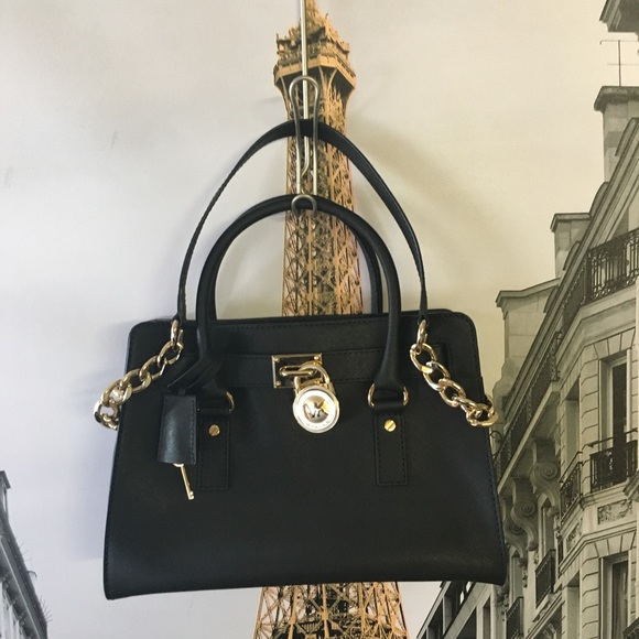 Michael Kors Handbags - NWOT Medium Black MK Saffiano satchel