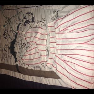 Two piece red & white out fit.