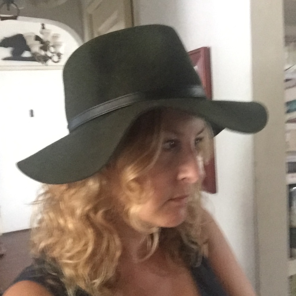 Dark green fedora with floppy brim