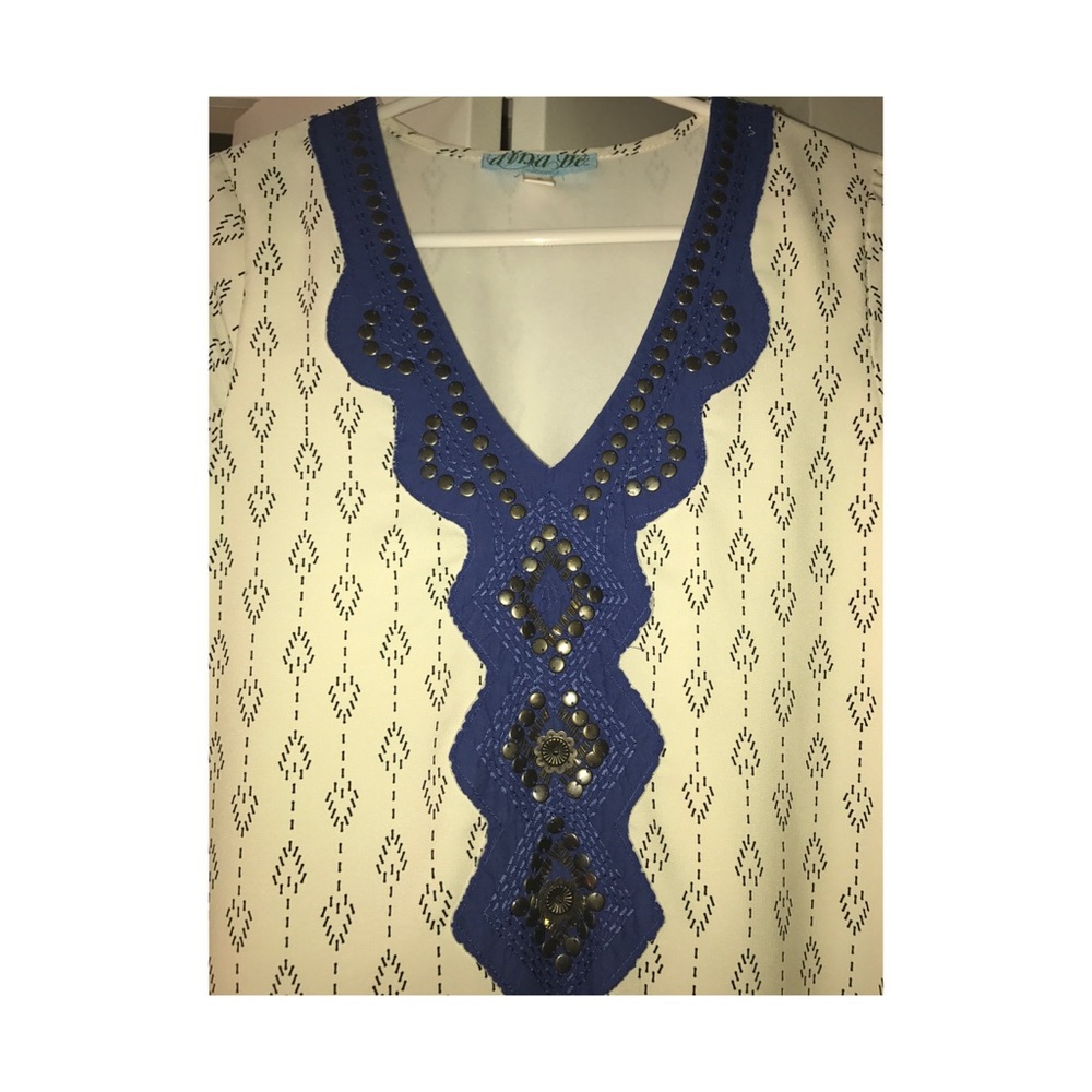 Tunic with embellishments.