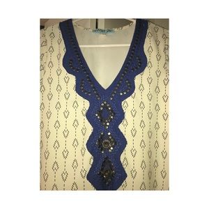 Tunic with embellishments.