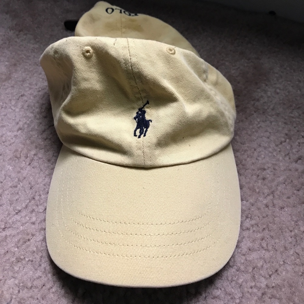 Yellow Ralph Lauren cap with leather brown strap.
