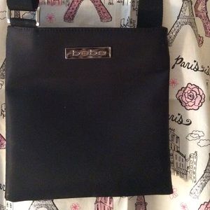 Bebe black crossover purse w/long adjustable strap