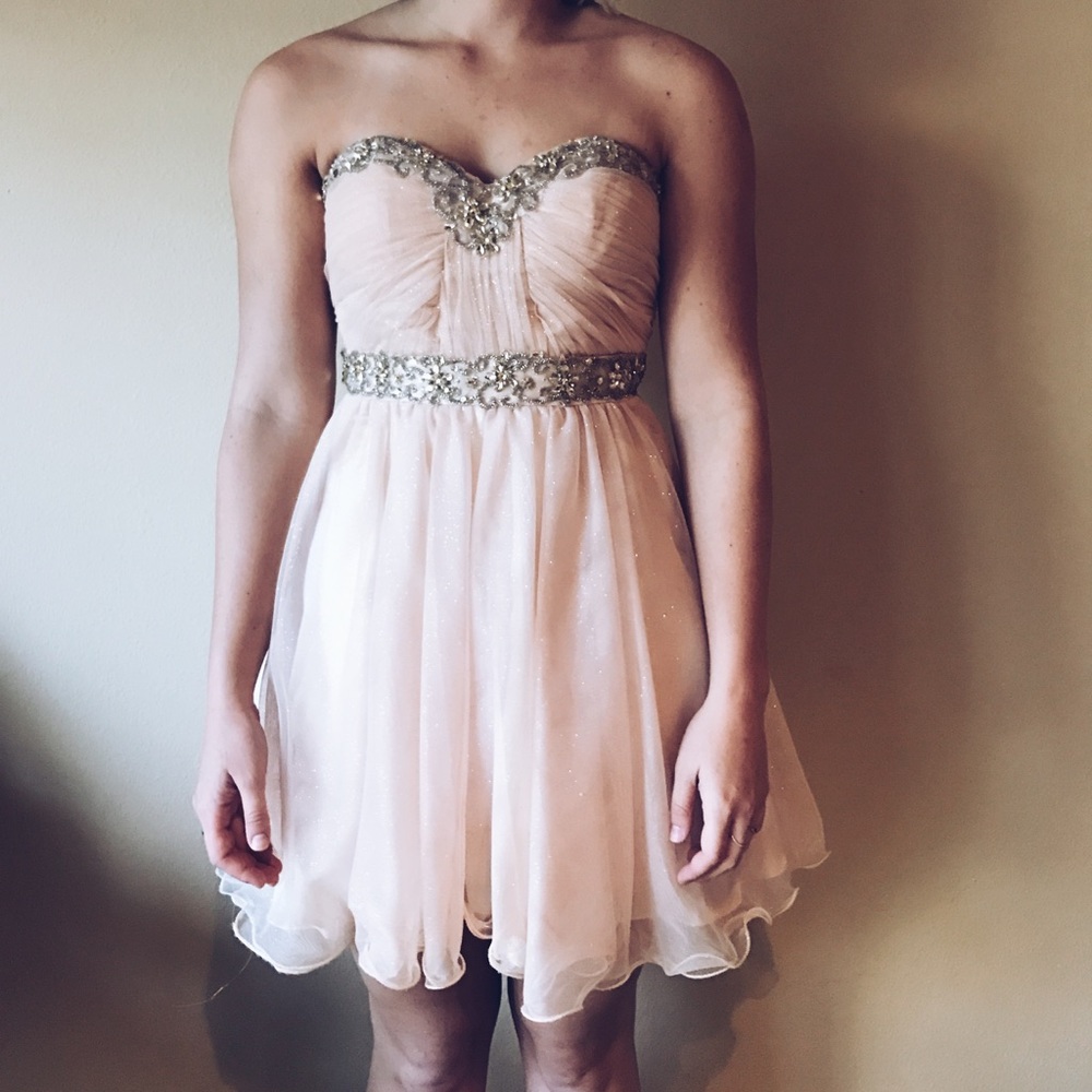 Strapless blush colored cocktail dress