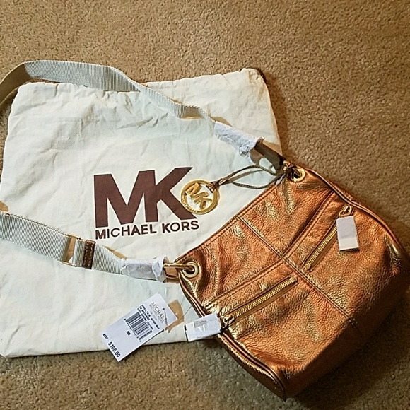 Michael Kors Handbags - Michael Kors crossbody gold multiple pockets