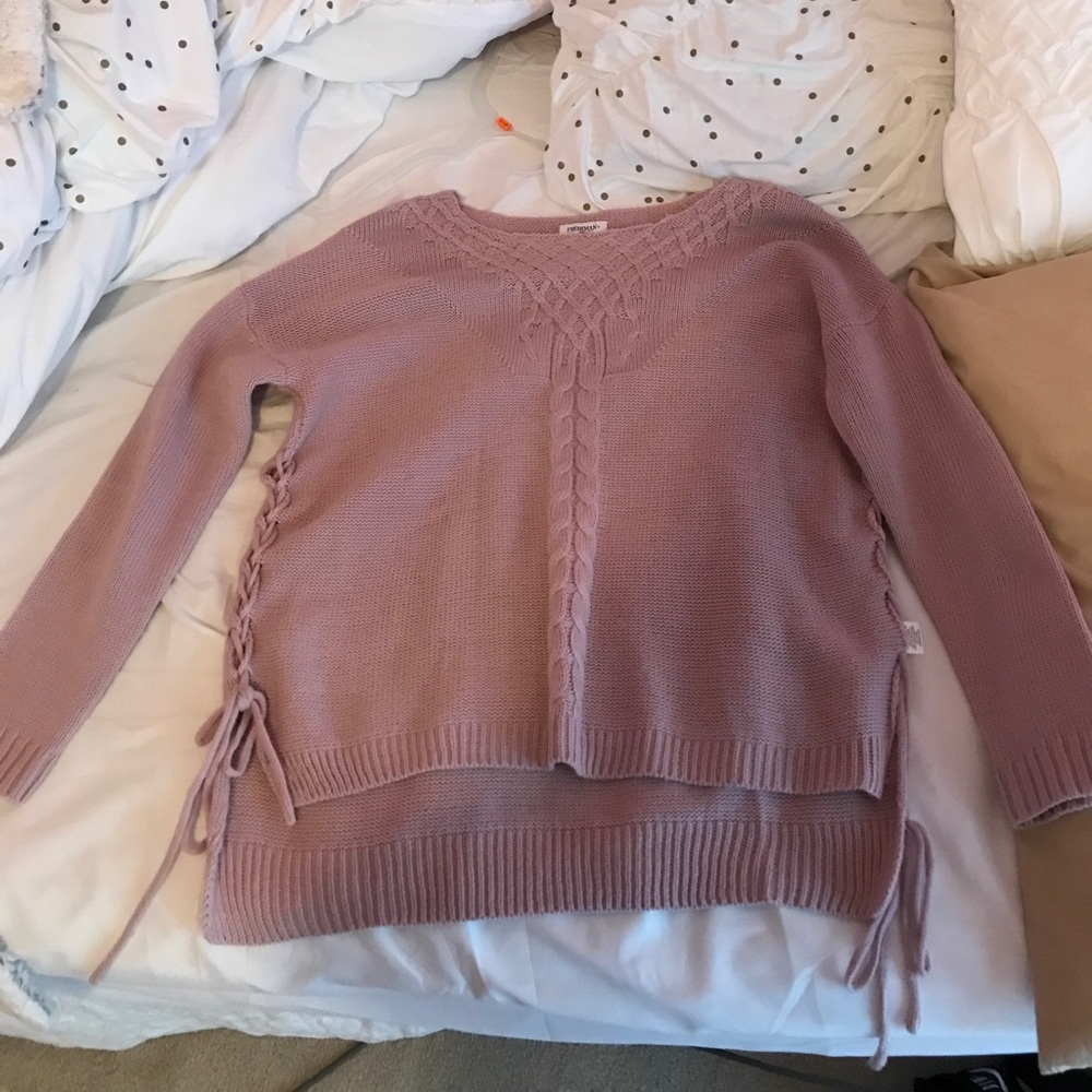 Sweater with laced up sides. Barely worn.