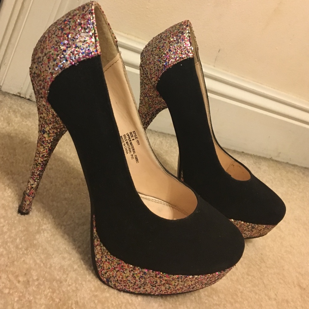 Black pumps with glitter detailing.