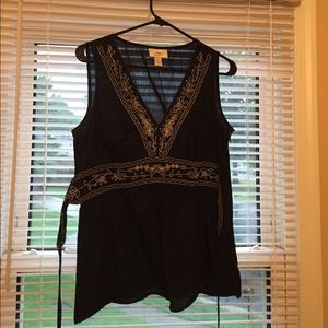 Sleeveless top with deep V neckline
