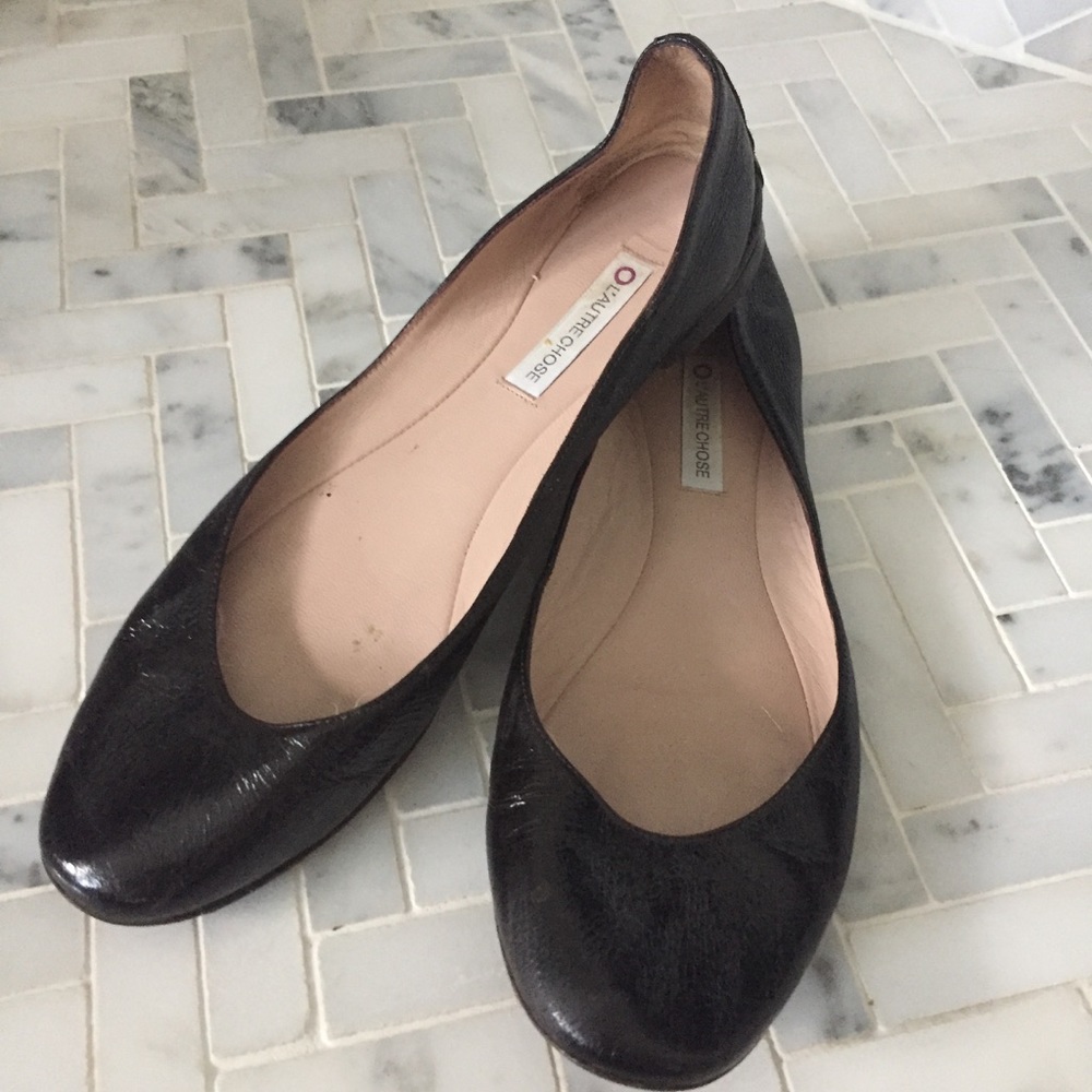 Black leather ballet flats