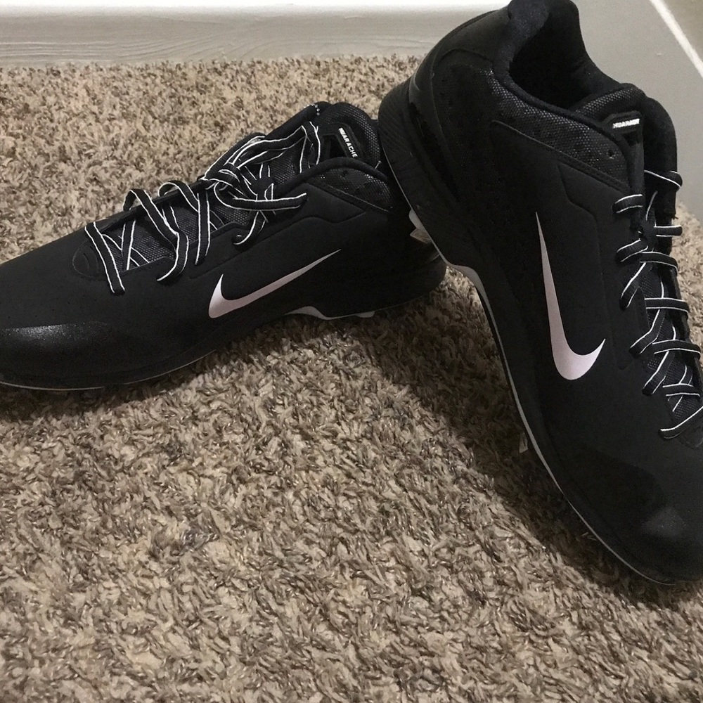 New Nike cleats shoes in black n white color