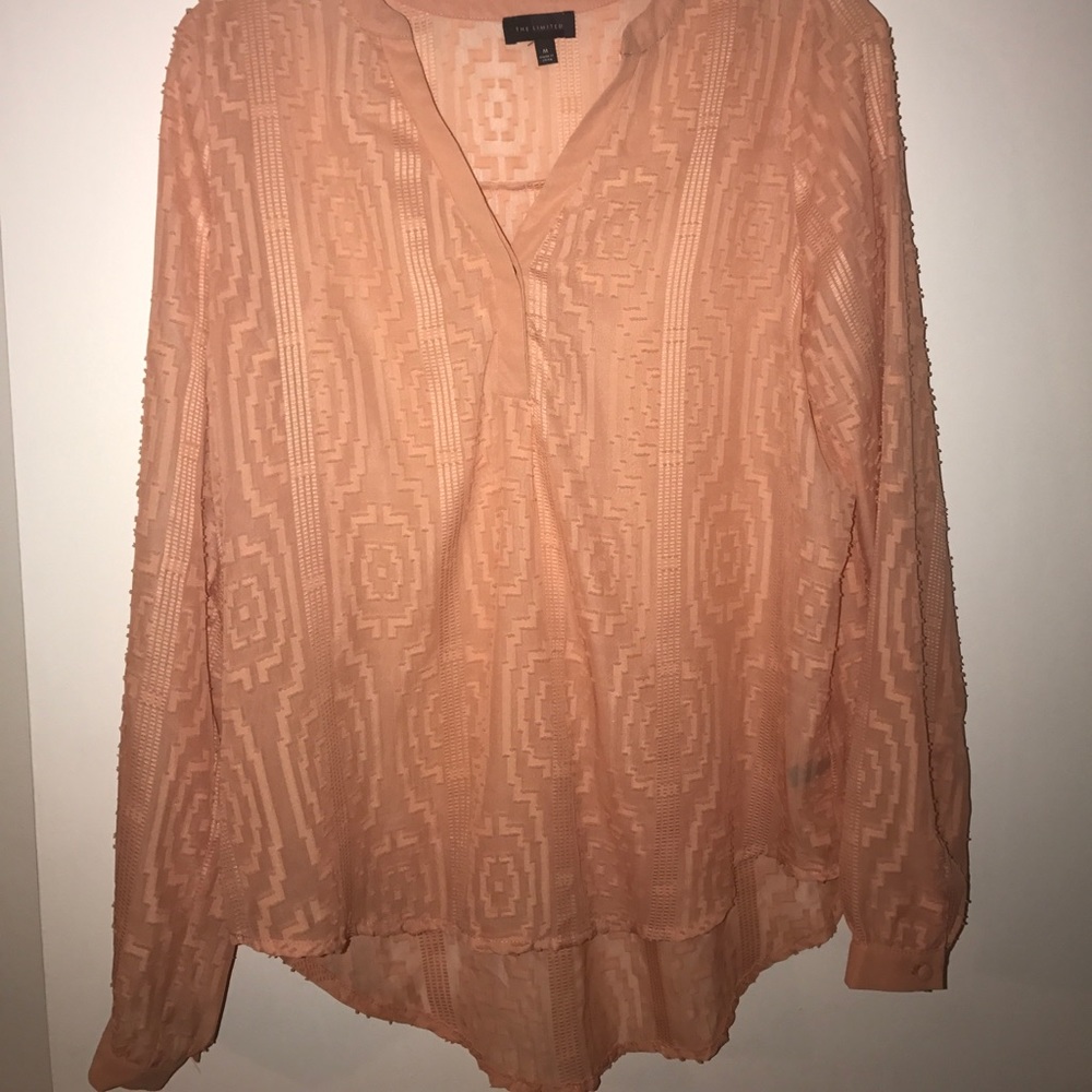 Textured blush top.