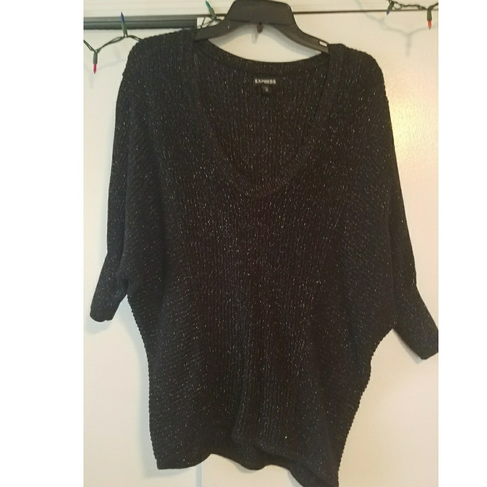 NOT YOUR ORDINARY BLACK SWEATER!