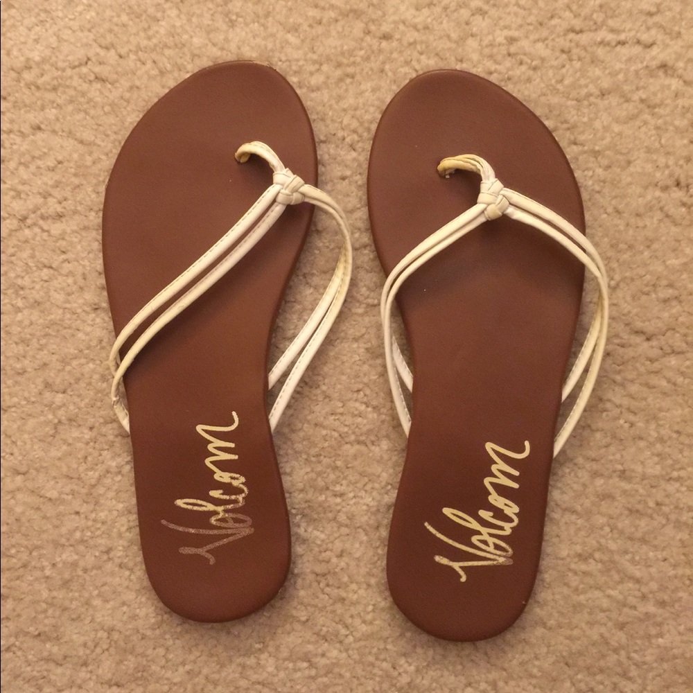 Tan and white Volvom sandals