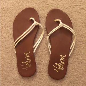 Tan and white Volvom sandals