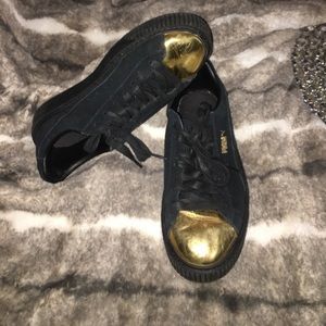 Black and Gold Pumas