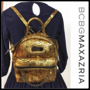 BCBG 🔥flash sale🔥gold mini backpack . Low low $