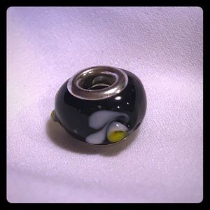 Black Glass Bead with White and Yellow Flower
