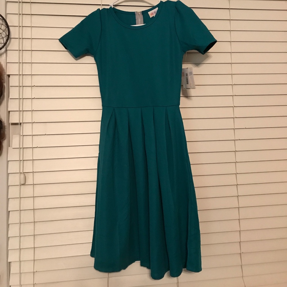 Deep Teal Lularoe amelia. BNWT