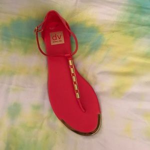Coral sandals with gold accents