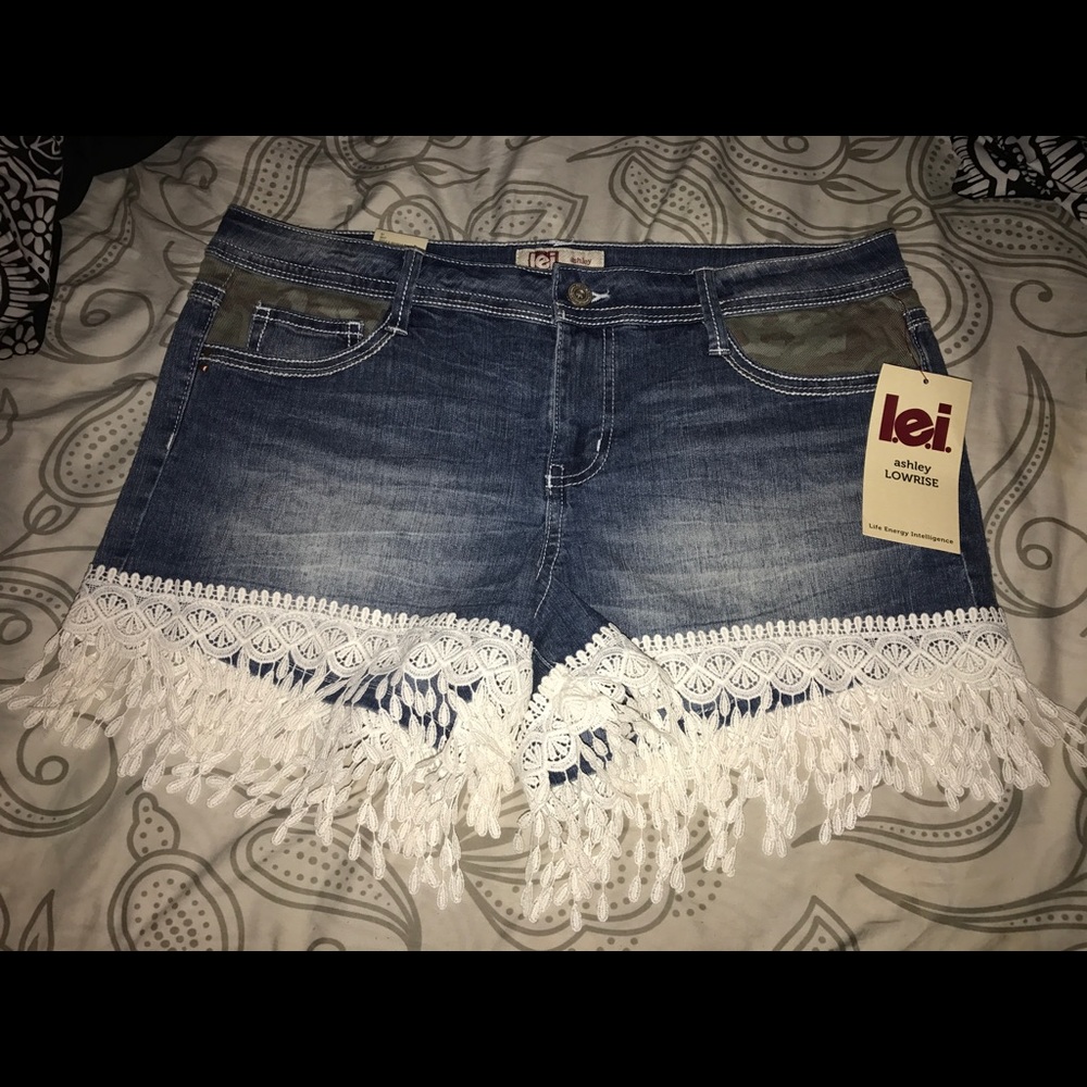 Low rise fringe shorts