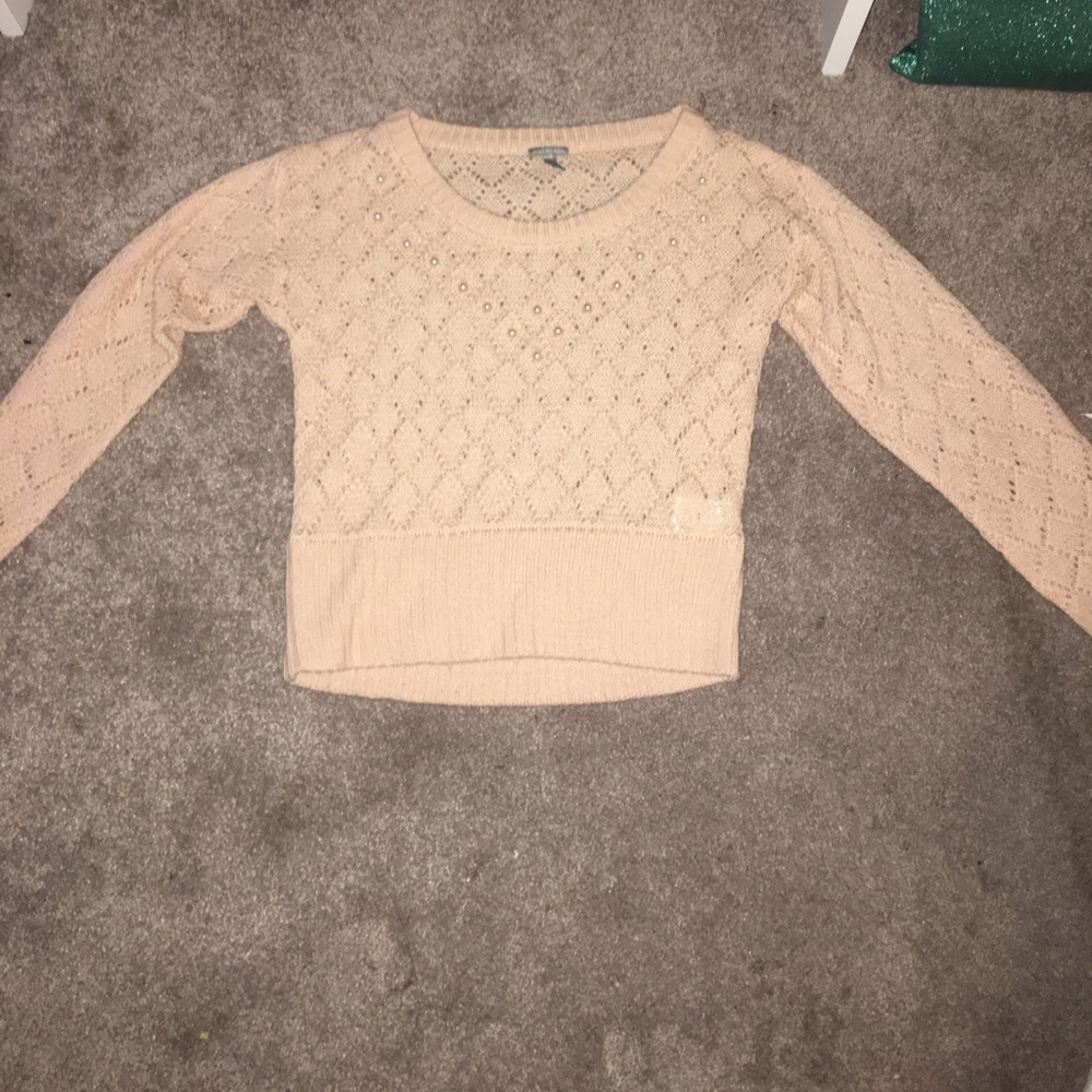 A light pink sweater