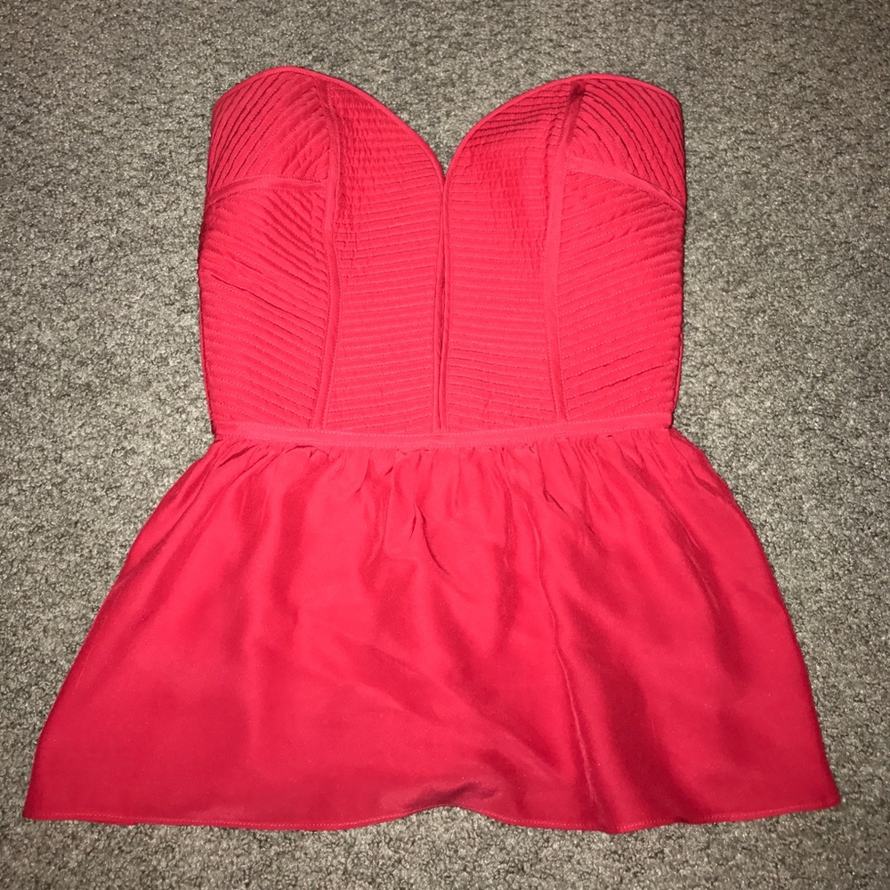 Pink peplum top