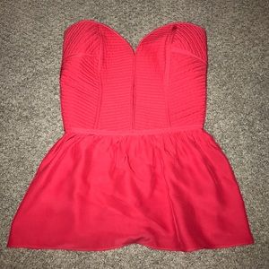 Pink peplum top