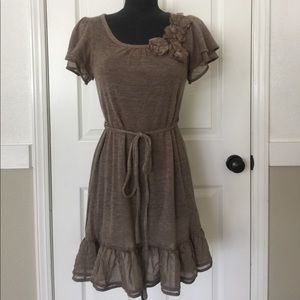 Very cute brown/beige dress with flower detail.