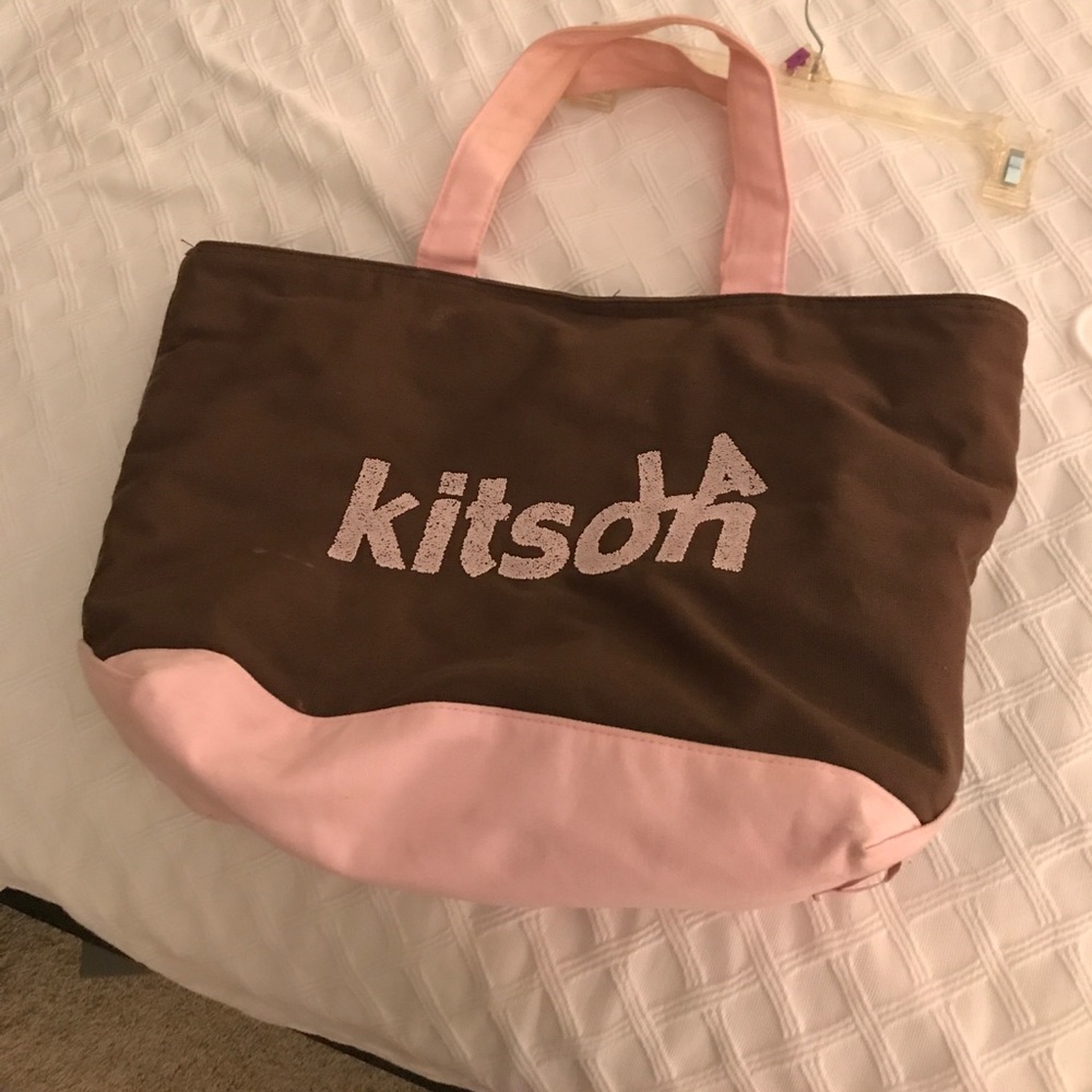 Brown and pink kits on tote with lining