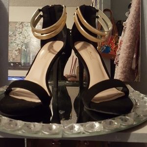 Black and gold heels