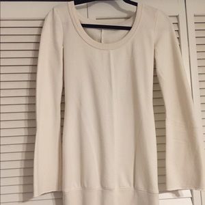 long white sweater. kind of like a dress.