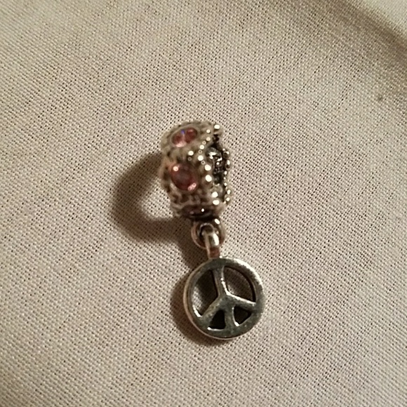 AUTHENTIC Pandora dangling Peace charm - Picture 1 of 1