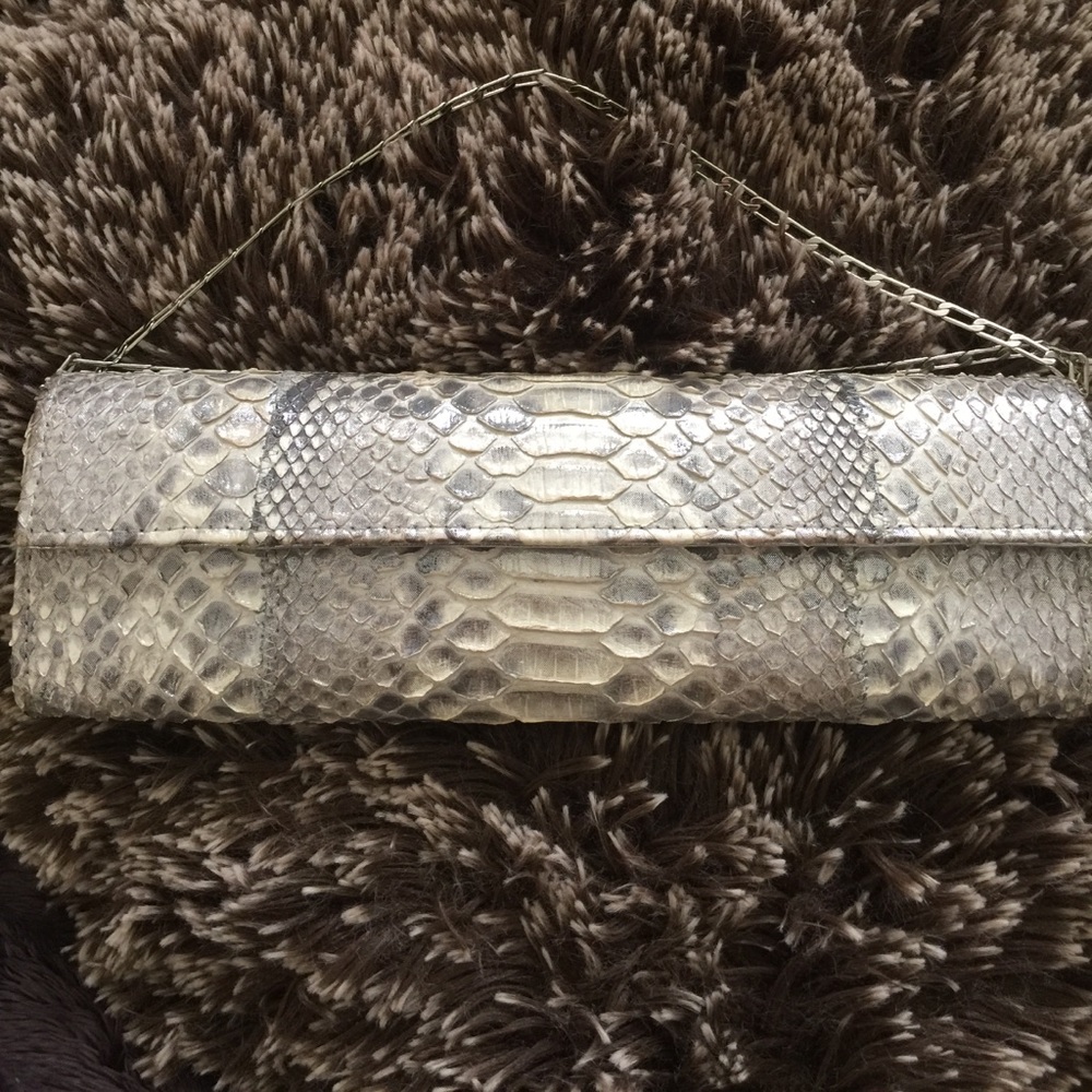 Fatto a Mano by Carlos Falchi clutch