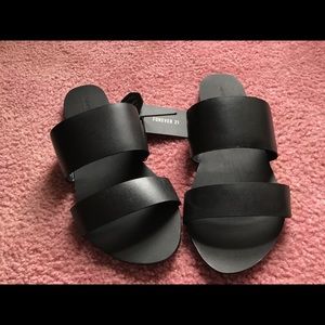 black leather strap sandals