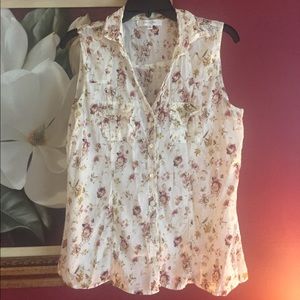 Sleeveless button down top