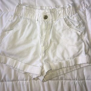 High waisted white Urban Outfitters shorts.