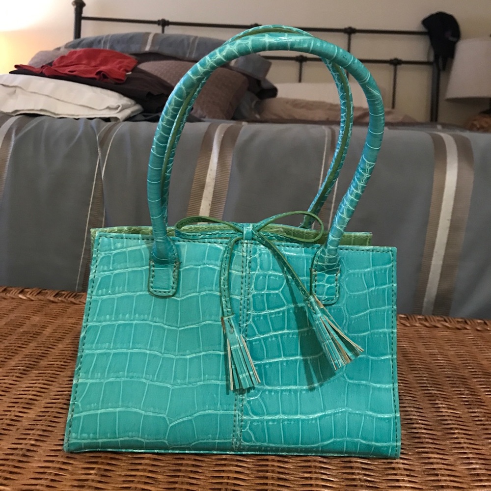 Turquoise snake print bag