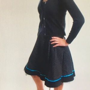 Black and white polka dot dress with blue fringe