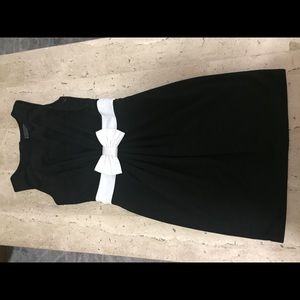 Black cinched waist bow dress