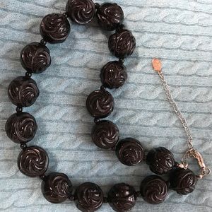 Resin necklace with swirl design