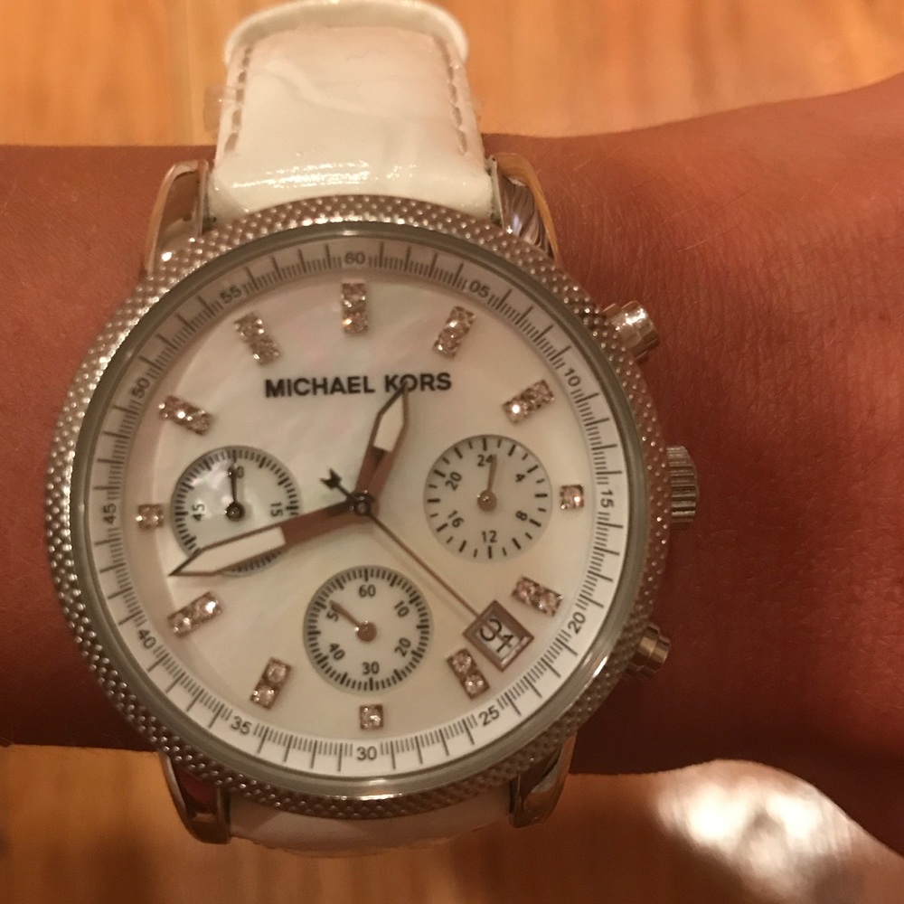 White leather Michael Kors watch. Rarely used