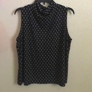 Pretty and comfortable shirt I have never worn.