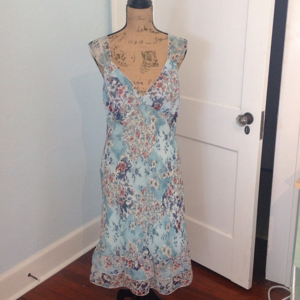 Beautiful bias cut knee length floral dress.