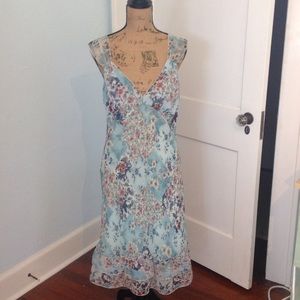 Beautiful bias cut knee length floral dress.