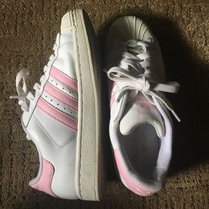 White and pink Adidas shoes
