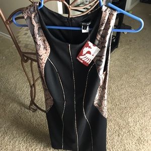 Black and snake skin dress