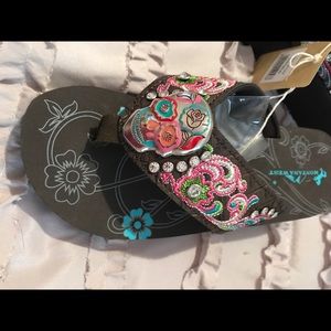 Sugar skull Montana West flip flops.