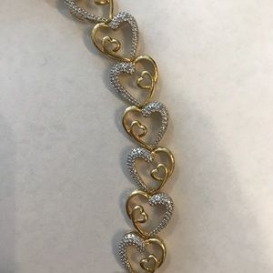 1/10 CT. T.W. Diamond Heart Bracelet (Never Worn!)