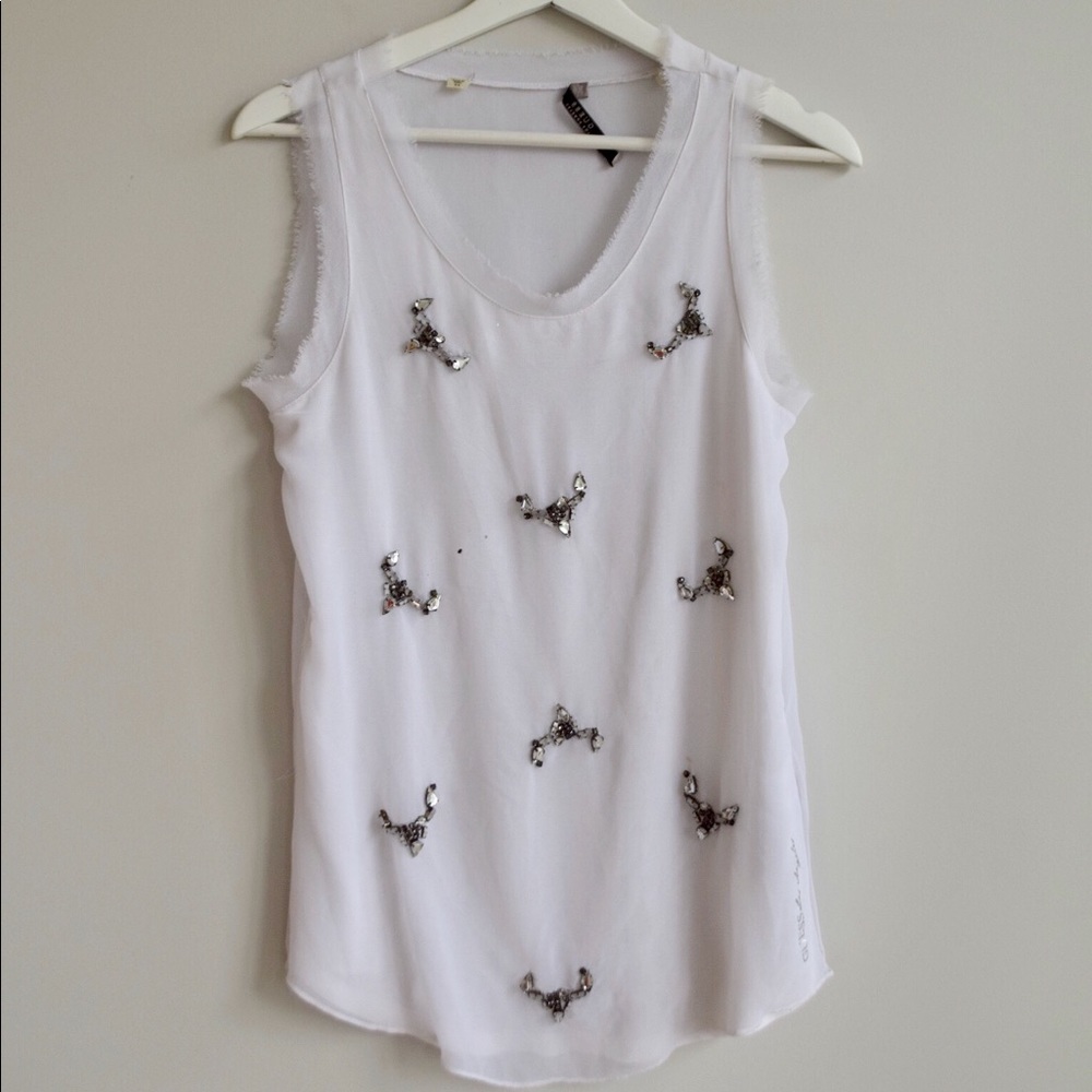Breezy and light embellished white tank top!